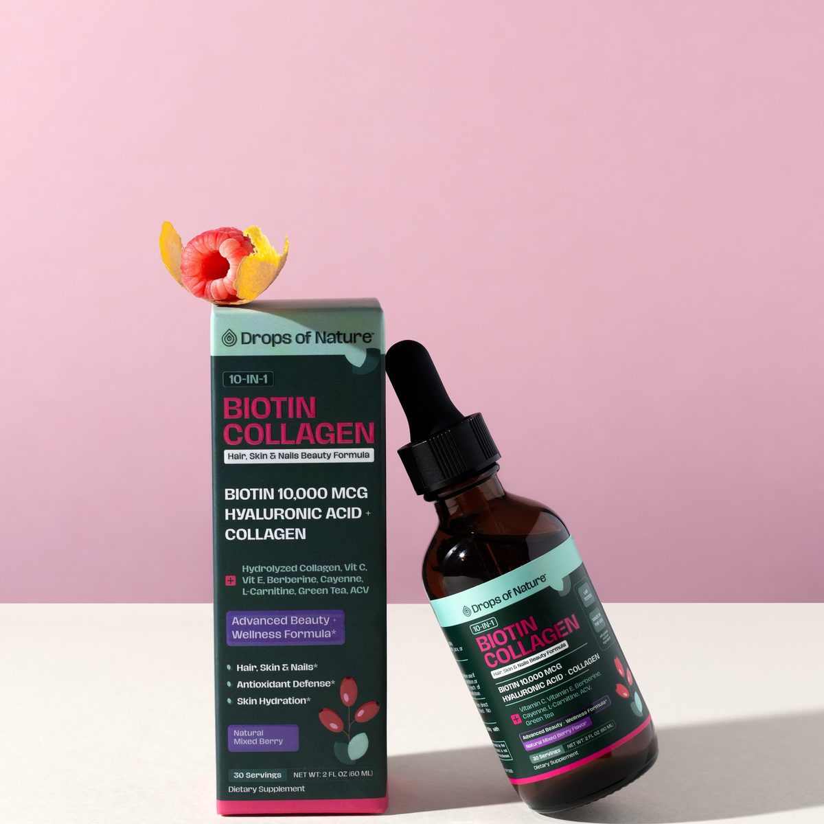 Biotin Collagen box and bottle on a wooden block with raspberries.
