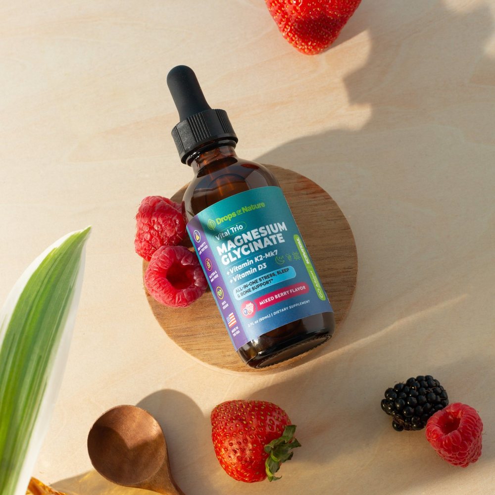 Magnesium Glycinate + D3 & K2 bottle with mixed berries.