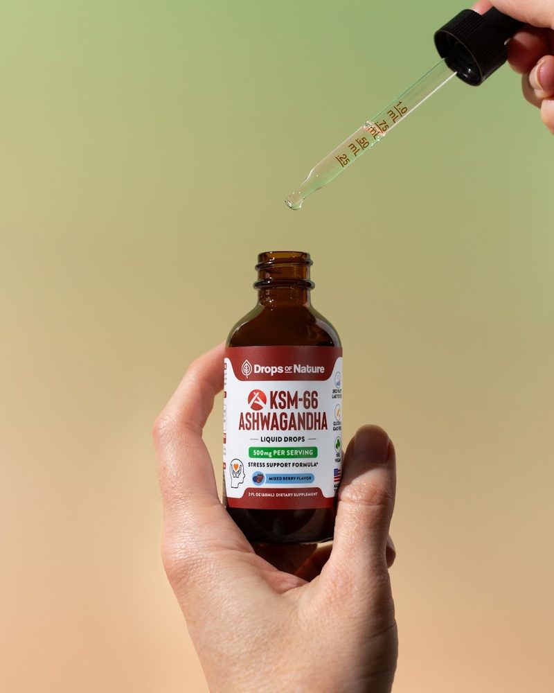Drops of Nature KSM-66 Ashwagandha liquid drops bottle held upright in hand