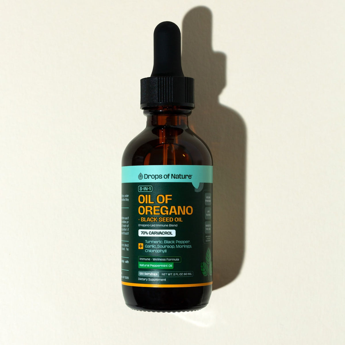 8-in-1 Oil of Oregano + Black Seed Oil bottle with black dropper.