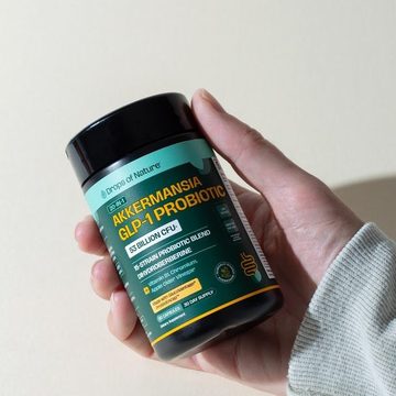 Akkermansia Probiotic bottle in hand