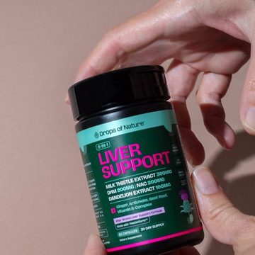 11-in-1 Liver Support bottle in hand